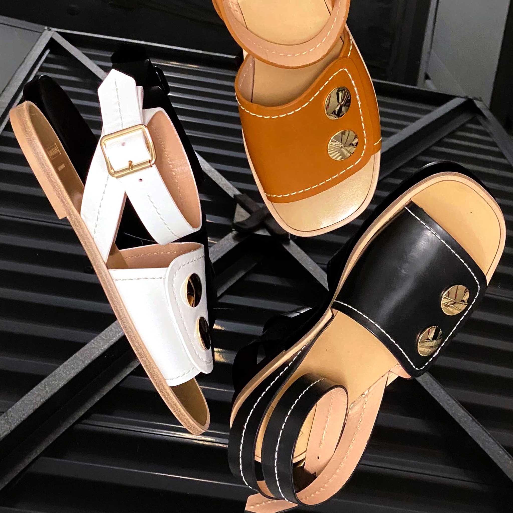 womens ankle strap leather sandals with fully covered leather vamp featuring oversized metal buckle and oversized metal gold studs with leather sole handmade in Italy
