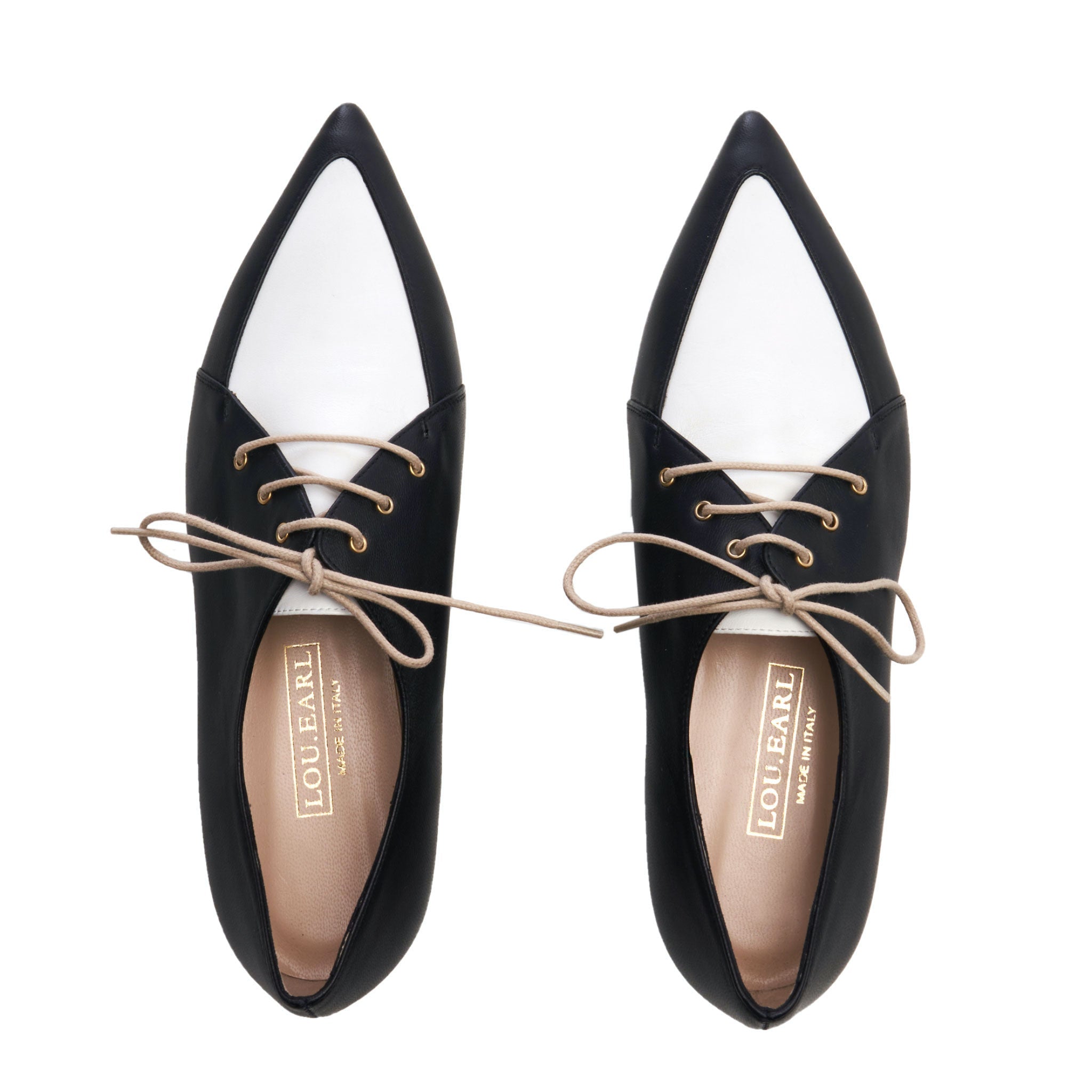 menswear inspired black and white two tone Oxford shoes for women. lace up, pointed toe style made in italy