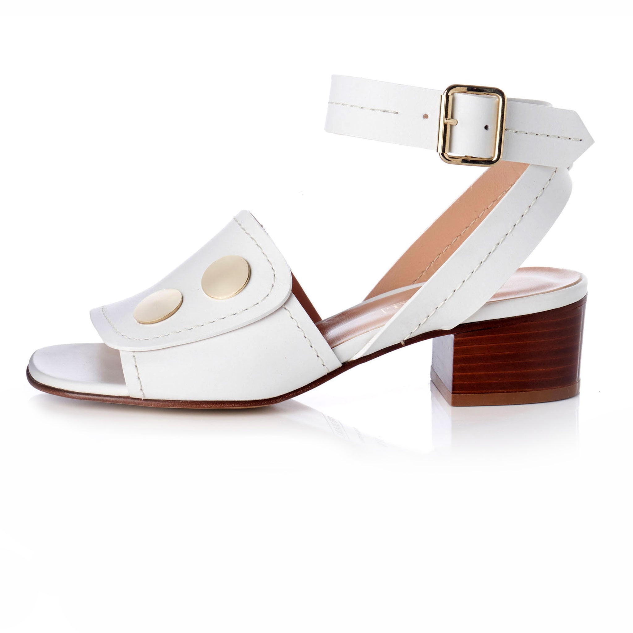 white open toe sandals with ankle strap and gold buckle detail. 2 inch heel and cushioned insole.