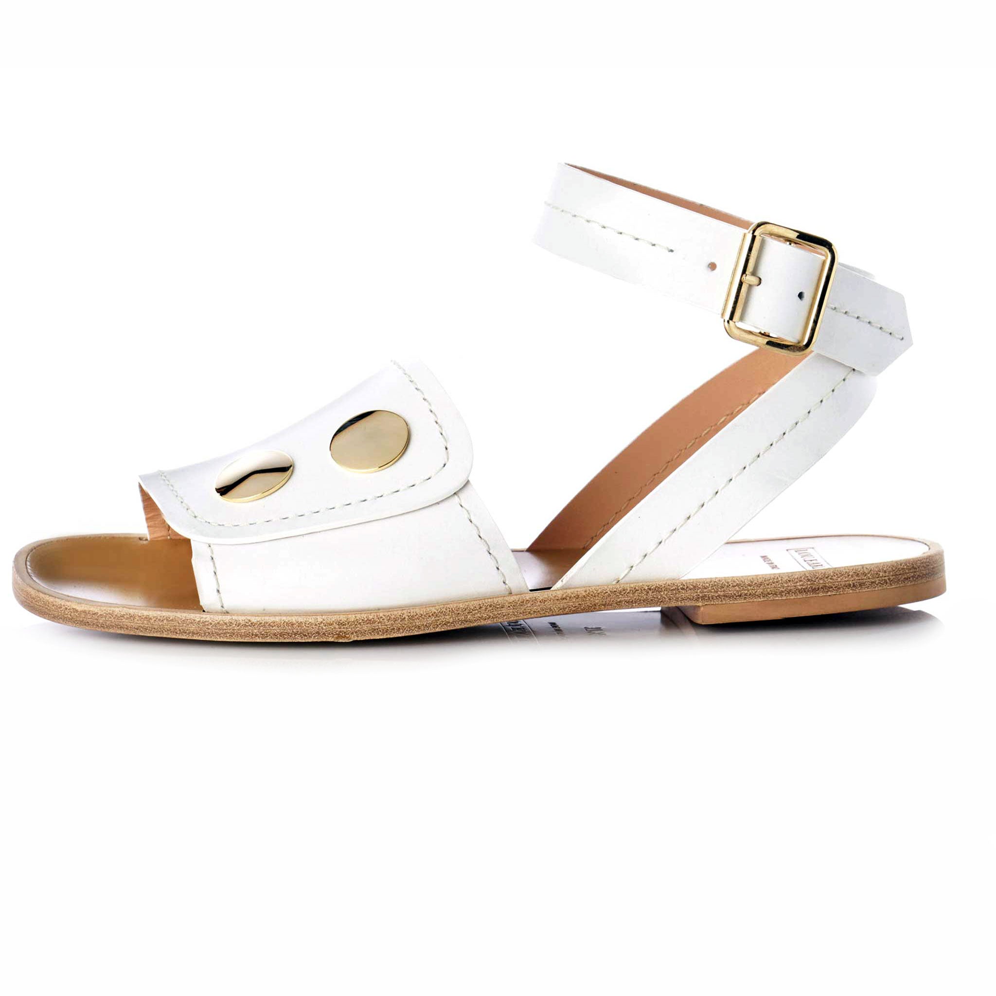 Euro fashion luxury leather womens sandal with a tan brown leather sole, open toe white leather upper with oversized stud detail, ankle strap and buckle detail 