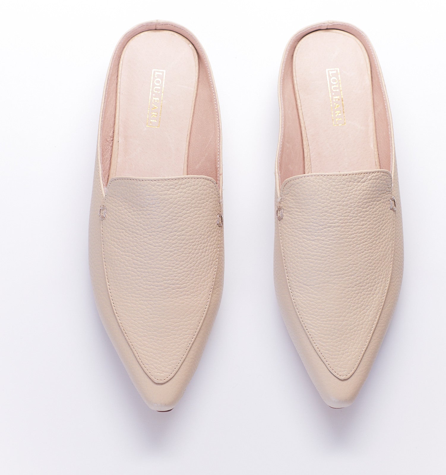 cream colored leather pointed toe mule slip on shoes for women. classic original mule shoes.
