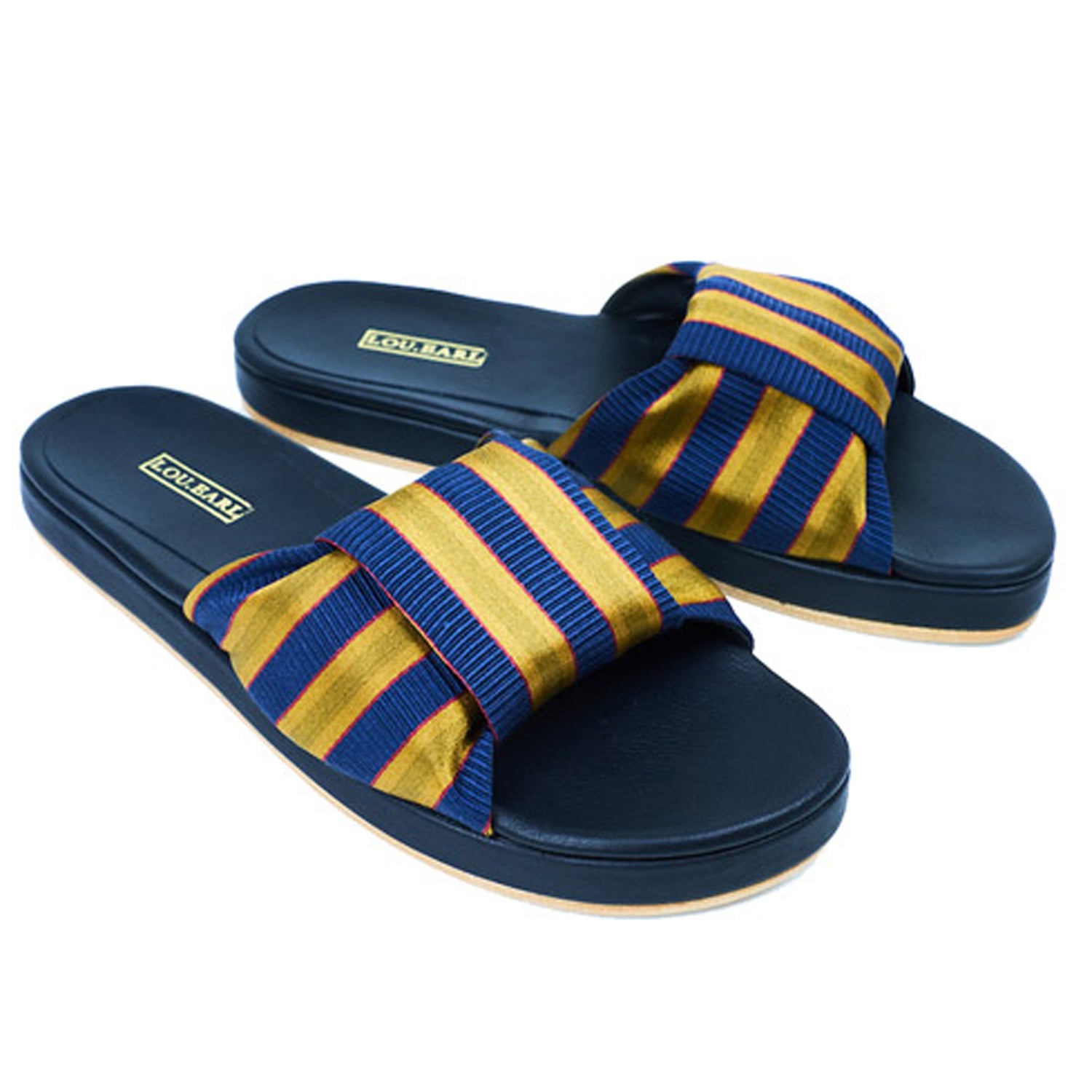 Navy and gold striped womens bowtie leather sandals with contoured footbed and gold logo. 